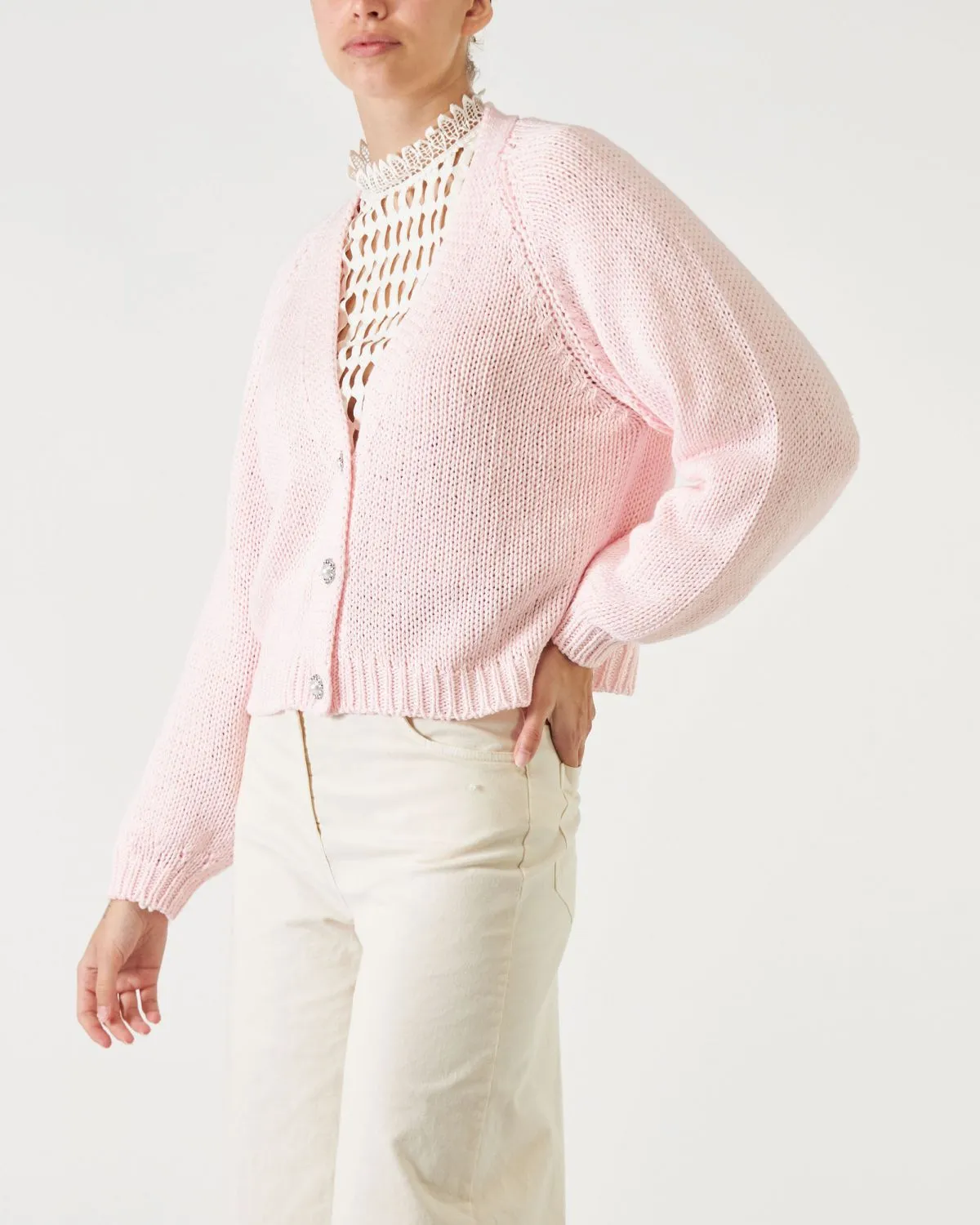 Cardigan crop di colore cipria