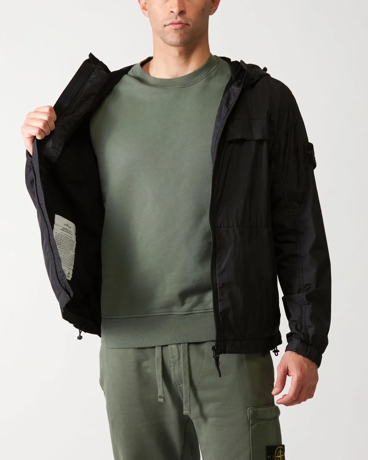 Giubbotto nero Soft-Shell con cappuccio