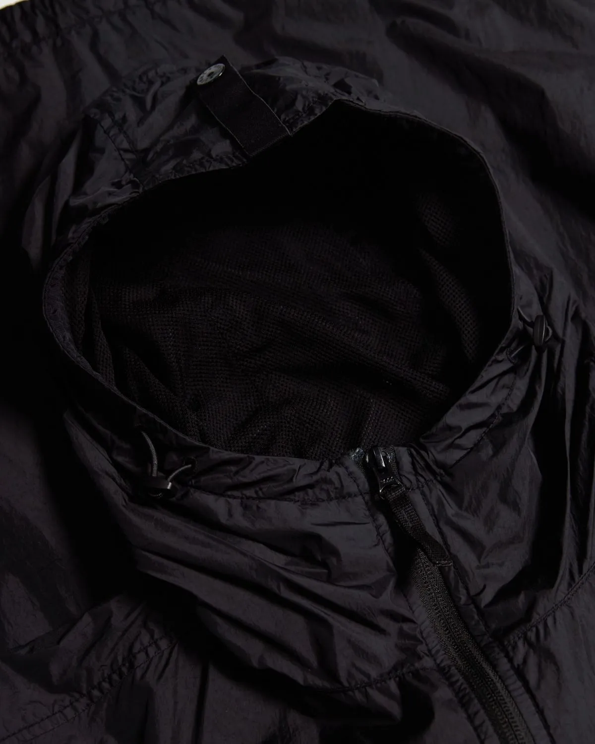 Giubbotto nero Soft-Shell con cappuccio
