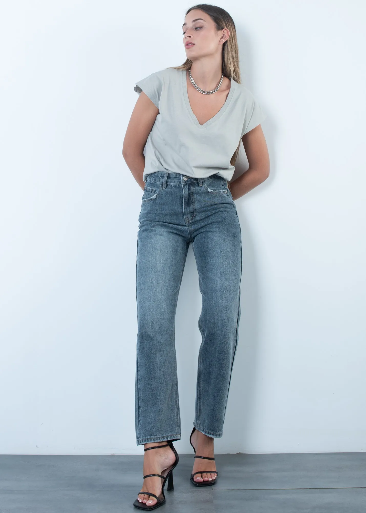 Jeans attillato a vita alta