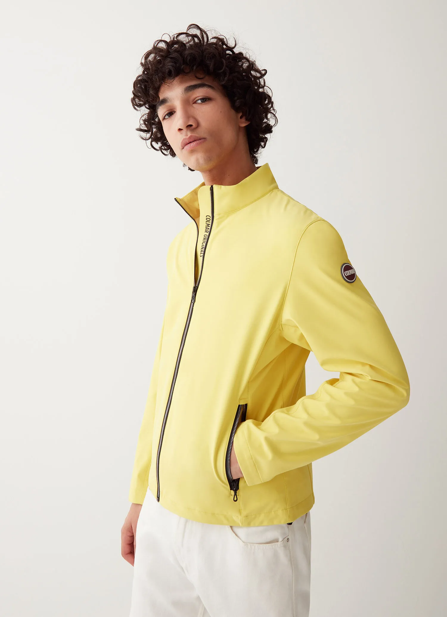 Softshell jacket with adjustment at the hem